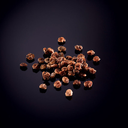 Dehydrated and peeled pink berries