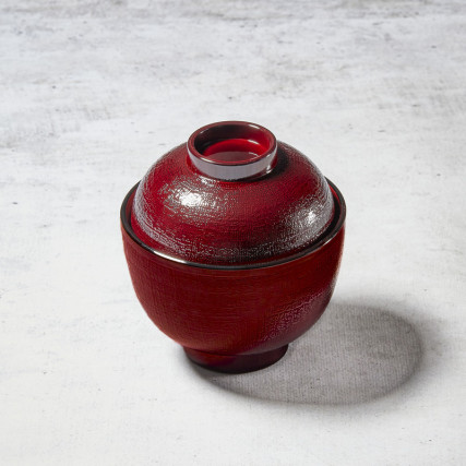 Traditional miso soup bowl with random lines and pattern fabric