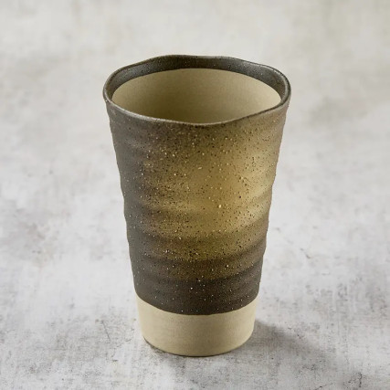 Rustic clay-style beer or water glass